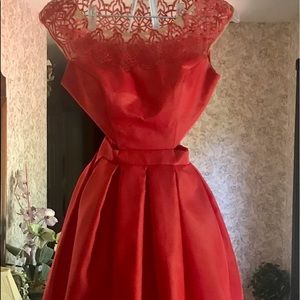 The red dress that beats that little black dress everyone else is wearing!